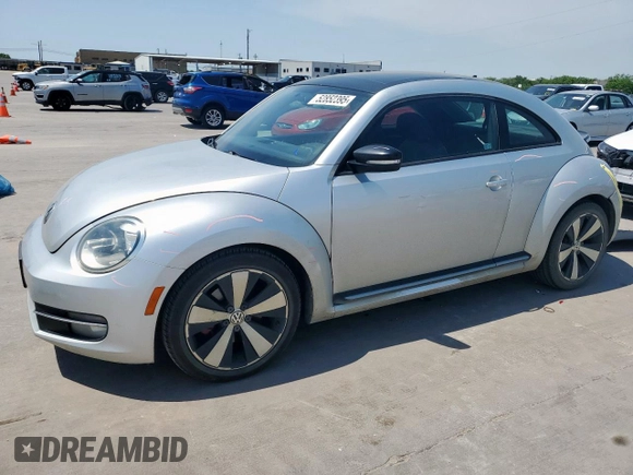 2012 Volkswagen Beetle with VIN 3VWV87AT7CM610251, listed as a Copart auction lot 52852395 with 77,550 mi miles and Salvage Title. Bid and sale history available at DreamBid. Image 1.