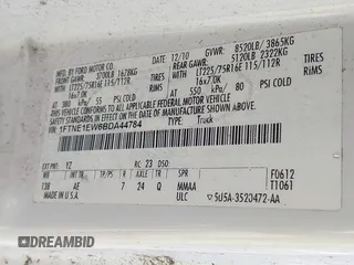 2011 Ford Econoline Cargo Commercial with VIN 1FTNE1EW6BDA44784, listed as a IAAI auction lot 42028659 with 141,661 mi miles and . Bid and sale history available at carsss.com. Image 9.