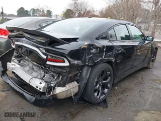2020 Dodge Charger SXT with VIN 2C3CDXBG2LH248260, listed as a IAAI auction lot 41654621 with 87,877 mi miles. Bid and sale history available at carsss.com. Image 4.