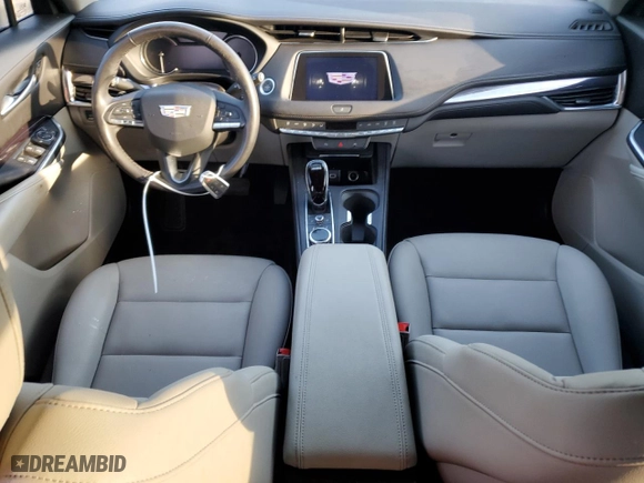 2022 Cadillac XT4 FWD Luxury with VIN 1GYAZAR40NF144779, listed as a Copart auction lot 75912804 with 9,805 mi miles and Non Repairable. Bid and sale history available at carsss.com. Image 8.