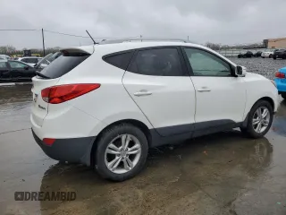 2013 Hyundai Tucson GLS with VIN KM8JU3AC0DU770079, listed as a Copart auction lot 52639835 with 212,894 mi miles and Clean Title. Bid and sale history available at carsss.com. Image 3.