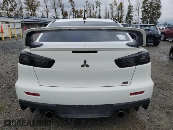 2010 Mitsubishi Lancer Evolution SE with VIN JA32W6FV3AU034052, listed as a Copart auction lot 72463644 with 44,517 mi miles and Salvage Title. Bid and sale history available at carsss.com. Image 6.