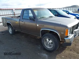 1988 Dodge Dakota with VIN 1B7GR14X0JS761859, listed as a IAAI auction lot 42012991 with 195,614 mi miles and . Bid and sale history available at DreamBid. Image 1.