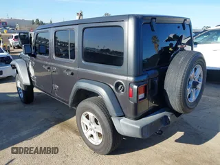 2018 Jeep Wrangler Unlimited Sport S z VIN 1C4HJXDG4JW132547, wystawiony jako IAAI lot #41838010 z przebiegiem 69 987 mil mil oraz . Historia ofert i sprzedaży dostępna na DreamBid. Obrazek 3.