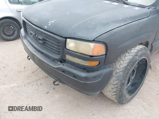 2002 GMC Yukon SLT z VIN 1GKEK13Z02R189557, wystawiony jako IAAI lot #42249286 z przebiegiem Nie podano mil oraz . Historia ofert i sprzedaży dostępna na DreamBid. Obrazek 6.