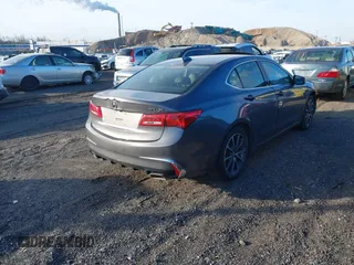 2019 Acura TLX with VIN 19UUB2F30KA002614, listed as a IAAI auction lot 41569334 with 96,320 mi miles and . Bid and sale history available at DreamBid. Image 4.