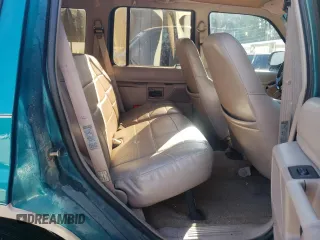 1994 Ford Explorer Eddie Bauer z VIN 1FMDU32X9RUE56887, wystawiony jako Copart lot #74450034 z przebiegiem 230 080 mil mil oraz Szkody całkowita. Historia ofert i sprzedaży dostępna na DreamBid. Obrazek 11.