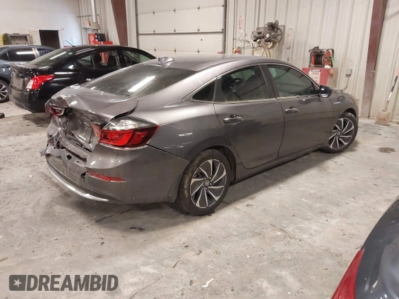 2022 Honda Insight Touring with VIN 19XZE4F98NE011462, listed as a IAAI auction lot 41620374 with 20,078 mi miles and . Bid and sale history available at DreamBid. Image 4.