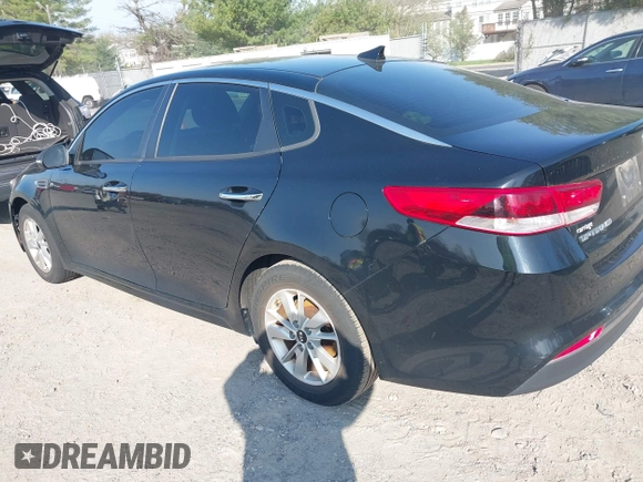 2016 Kia Optima LX with VIN 5XXGT4L36GG105637, listed as a IAAI auction lot 42013800 with 111,836 mi miles. Bid and sale history available at carsss.com. Image 3.
