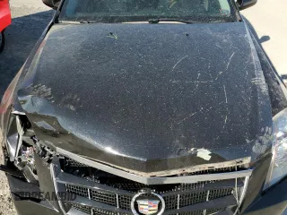 2009 Cadillac CTS AWD w/1SB with VIN 1G6DT57V790104976, listed as a Copart auction lot 76904004 with 144,300 mi miles and Salvage Title. Bid and sale history available at carsss.com. Image 12.