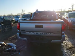 2021 Toyota Tacoma SR z VIN 3TMCZ5AN5MM386394, wystawiony jako IAAI lot #41821364 z przebiegiem 54 070 mil mil oraz . Historia ofert i sprzedaży dostępna na DreamBid. Obrazek 17.