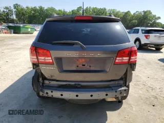 2017 Dodge Journey SE with VIN 3C4PDCAB6HT621987, listed as a Copart auction lot 52559305 with 169,468 mi miles and Salvage Title. Bid and sale history available at DreamBid. Image 6.