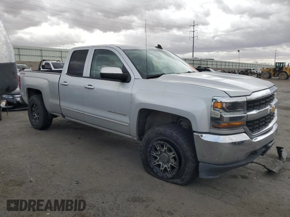 2018 Chevrolet Silverado 1500 LT with VIN 1GCVKREC2JZ180747, listed as a Copart auction lot 50405905 with 131,772 mi miles and Salvage Title. Bid and sale history available at DreamBid. Image 4.