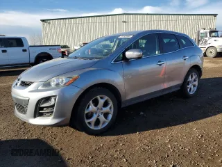 2011 Mazda CX-7 S Grand Touring z VIN JM3ER4D32B0379567, wystawiony jako Copart lot #79163864 z przebiegiem 142 292 mil mil oraz Czysty tytuł • Clean title. Historia ofert i sprzedaży dostępna na DreamBid. Obrazek 1.