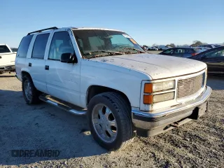 1997 GMC Yukon with VIN 1GKEK13R7VJ748007, listed as a Copart auction lot 41828585 with 209,516 mi miles and Clean Title. Bid and sale history available at carsss.com. Image 4.