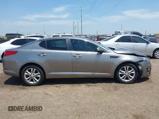 2013 Kia Optima EX z VIN 5XXGN4A7XDG258162, wystawiony jako IAAI lot #42228606 z przebiegiem 129 296 mil mil oraz . Historia ofert i sprzedaży dostępna na DreamBid. Obrazek 13.
