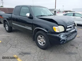 2004 Toyota Tundra SR5 with VIN 5TBRT34104S450052, listed as a IAAI auction lot 42032365 with 243,989 mi miles. Bid and sale history available at carsss.com. Image 1.