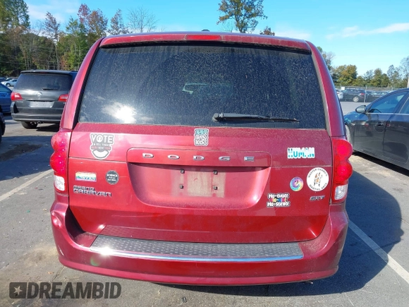 2014 Dodge Grand Caravan SXT with VIN 2C4RDGCG8ER311850, listed as a IAAI auction lot 40598088 with 138,010 mi miles and . Bid and sale history available at DreamBid. Image 16.