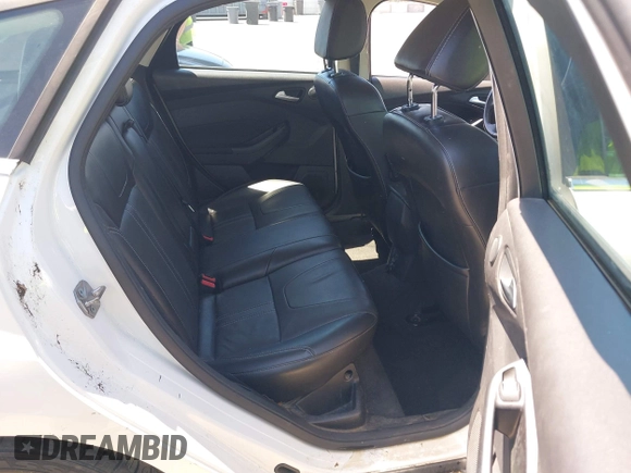 2014 Ford Focus Titanium with VIN 1FADP3N27EL330366, listed as a IAAI auction lot 42719377 with 97,009 mi miles and . Bid and sale history available at DreamBid. Image 8.