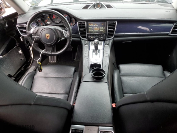 2016 Porsche Panamera 4 with VIN WP0AA2A73GL005632, listed as a Copart auction lot 77326773 with 71,385 mi miles. Bid and sale history available at carsss.com. Image 8.