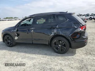 2024 Volkswagen Tiguan SE R-Line Black z VIN 3VVCB7AX8RM072281, wystawiony jako Copart lot #54356745 z przebiegiem 10 562 mil mil oraz Szkoda całkowita • Salvage title. Historia ofert i sprzedaży dostępna na DreamBid. Obrazek 2.