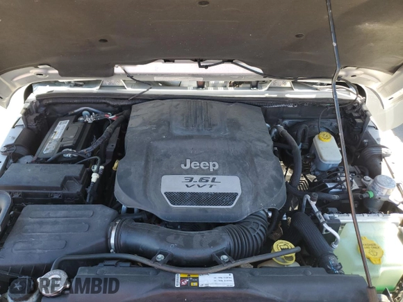 2012 Jeep Wrangler Unlimited Call of Duty MW3 with VIN 1C4BJWFG9CL199551, listed as a Copart auction lot 57097555 with 43,651 mi miles and Salvage title. Bid and sale history available at DreamBid. Image 12.