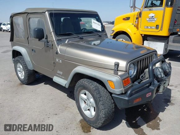 2003 Jeep Wrangler X with VIN 1J4FA39S03P312550, listed as a IAAI auction lot 41837150 with 127,239 mi miles and . Bid and sale history available at DreamBid. Image 1.