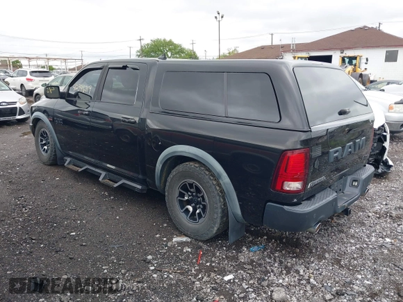 2016 Ram 1500 Rebel z VIN 1C6RR7YT0GS100285, wystawiony jako IAAI lot #42346719 z przebiegiem 103 309 mil mil oraz . Historia ofert i sprzedaży dostępna na DreamBid. Obrazek 3.