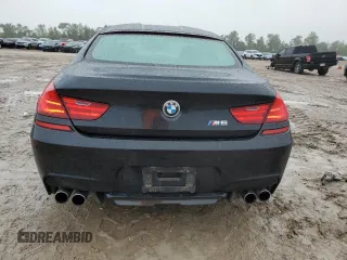 2015 BMW M6 z VIN WBS6C9C50FD467894, wystawiony jako Copart lot #70394234 z przebiegiem 72 625 mil mil oraz Szkoda całkowita • Salvage title. Historia ofert i sprzedaży dostępna na DreamBid. Obrazek 6.