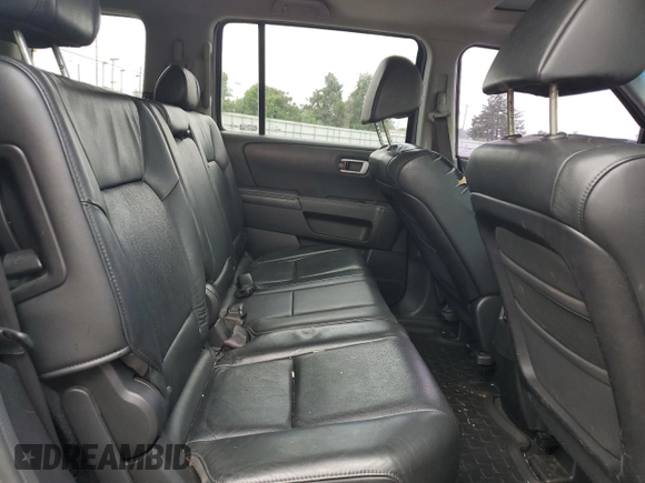 2009 Honda Pilot EX-L z VIN 5FNYF485X9B053974, wystawiony jako Copart lot #58231475 z przebiegiem 222 489 mil mil oraz Szkoda całkowita • Salvage title. Historia ofert i sprzedaży dostępna na DreamBid. Obrazek 11.