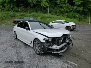 2019 BMW 5 Series M550i xDrive with VIN WBAJB9C54KB288569, listed as a Copart auction lot 58707235 with Not provided miles and Salvage title. Bid and sale history available at DreamBid. Image 14.