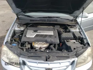 2006 Kia Spectra EX with VIN KNAFE121165250136, listed as a Copart auction lot 67966364 with 105,067 mi miles and Clean Title. Bid and sale history available at carsss.com. Image 11.