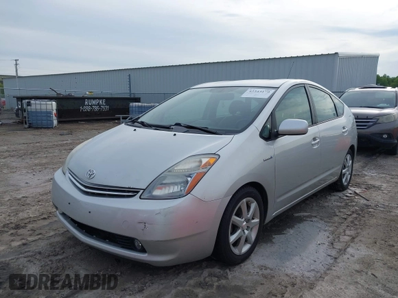 2007 Toyota Prius z VIN JTDKB20U173284944, wystawiony jako IAAI lot #42343170 z przebiegiem 172 776 mil mil oraz . Historia ofert i sprzedaży dostępna na DreamBid. Obrazek 2.
