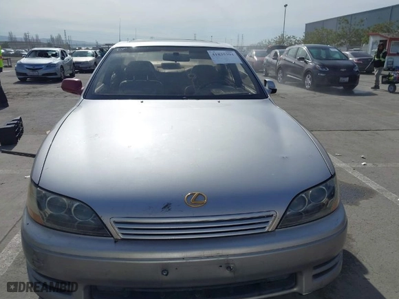1995 Lexus ES 300 with VIN JT8GK13T0S0100914, listed as a IAAI auction lot 41835394 with 216,277 mi miles. Bid and sale history available at carsss.com. Image 11.