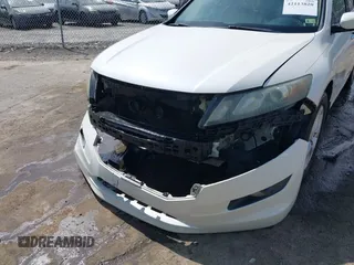 2010 Honda Crosstour EX-L z VIN 5J6TF2H55AL011092, wystawiony jako IAAI lot #42113820 z przebiegiem 239 179 mil mil oraz . Historia ofert i sprzedaży dostępna na DreamBid. Obrazek 6.