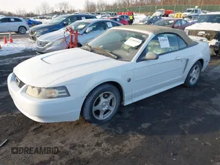 2004 Ford Mustang Deluxe with VIN 1FAFP446X4F214949, listed as a IAAI auction lot 41386560 with 172,410 mi miles. Bid and sale history available at carsss.com. Image 2.