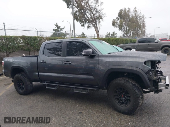 2023 Toyota Tacoma SR5 z VIN 3TMDZ5BN4PM148379, wystawiony jako IAAI lot #41547628 z przebiegiem 30 001 mil mil oraz . Historia ofert i sprzedaży dostępna na DreamBid. Obrazek 14.
