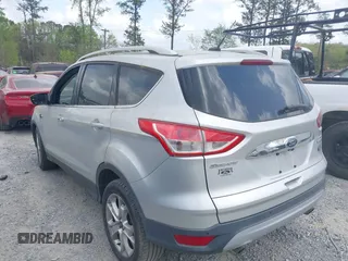 2015 Ford Escape Titanium with VIN 1FMCU0J98FUA87044, listed as a IAAI auction lot 41952096 with 257,437 mi miles. Bid and sale history available at carsss.com. Image 3.