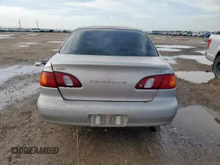 1999 Toyota Corolla VE z VIN 1NXBR12E0XZ215258, wystawiony jako Copart lot #60704095 z przebiegiem Nie podano mil oraz Szkoda całkowita • Salvage title. Historia ofert i sprzedaży dostępna na DreamBid. Obrazek 6.
