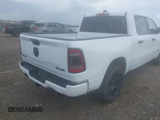 2023 Ram 1500 Laramie with VIN 1C6SRFJT3PN541901, listed as a IAAI auction lot 42156766 with 58,082 mi miles and . Bid and sale history available at DreamBid. Image 4.
