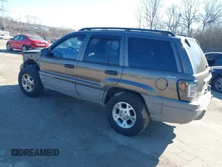 1999 Jeep Grand Cherokee Laredo with VIN 1J4GW58NXXC623753, listed as a IAAI auction lot 41685540 with 190,134 mi miles and . Bid and sale history available at DreamBid. Image 3.