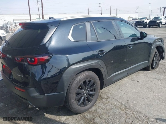 2024 Mazda CX-50 2.5 S Premium Package with VIN 7MMVABDM7RN198538, listed as a IAAI auction lot 41481055 with 54,921 mi miles. Bid and sale history available at carsss.com. Image 4.