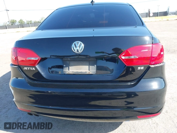 2014 Volkswagen Jetta SE z VIN 3VWD17AJ4EM419839, wystawiony jako IAAI lot #41994141 z przebiegiem 102 068 mil mil oraz . Historia ofert i sprzedaży dostępna na DreamBid. Obrazek 16.