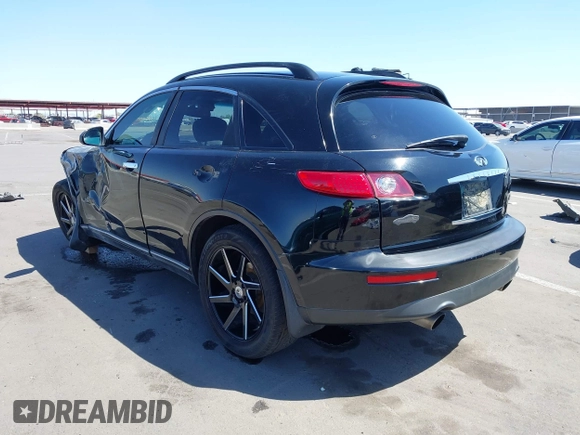 2005 Infiniti FX35 with VIN JNRAS08W95X215995, listed as a IAAI auction lot 42085118 with 295,901 mi miles. Bid and sale history available at carsss.com. Image 3.