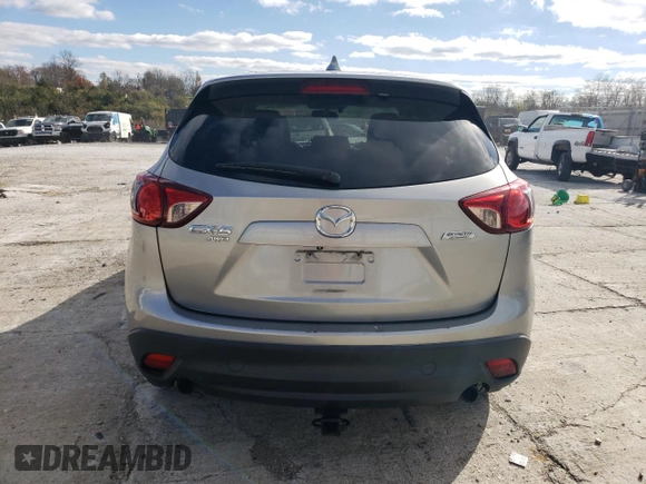 2013 Mazda CX-5 Grand Touring with VIN JM3KE4DE8D0102280, listed as a Copart auction lot 79750774 with 151,797 mi miles and Salvage Title. Bid and sale history available at DreamBid. Image 6.