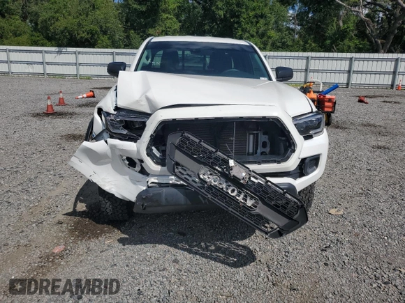 2020 Toyota Tacoma SR with VIN 3TYSZ5AN5LT006078, listed as a Copart auction lot 61758015 with 46,519 mi miles and Salvage title. Bid and sale history available at DreamBid. Image 5.