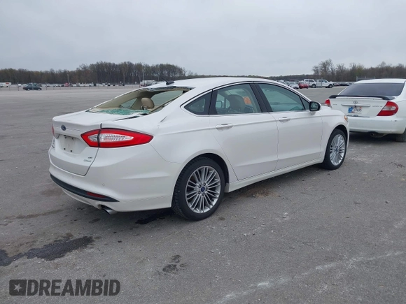 2014 Ford Fusion SE with VIN 3FA6P0HD5ER232622, listed as a IAAI auction lot 41998936 with 133,832 mi miles and . Bid and sale history available at DreamBid. Image 4.