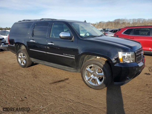 2011 Chevrolet Suburban LTZ with VIN 1GNSKKE33BR187175, listed as a Copart auction lot 47043715 with NaN miles and Salvage Title. Bid and sale history available at carsss.com. Image 4.