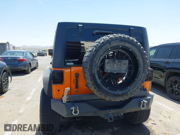 2012 Jeep Wrangler Unlimited Sport RHD with VIN 1C4BJWKGXCL221613, listed as a IAAI auction lot 42327004 with 129,375 mi miles and . Bid and sale history available at DreamBid. Image 16.