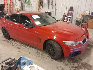 2015 BMW 4 Series 428i z VIN WBA4A9C52FGL85049, wystawiony jako IAAI lot #41649475 z przebiegiem 100 443 mil mil oraz . Historia ofert i sprzedaży dostępna na DreamBid. Obrazek 1.